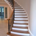 Designer curved timbber staircase with walnut treads